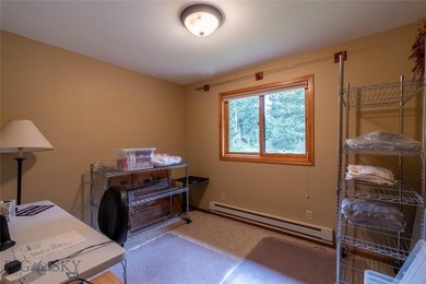 Nestled among the pines in a peaceful mountain setting, this - photo 36
