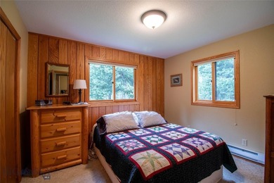Nestled among the pines in a peaceful mountain setting, this - photo 38