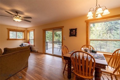 Nestled among the pines in a peaceful mountain setting, this - photo 49