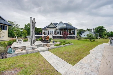 Welcome to this luxurious updated waterfront home in the - photo 11