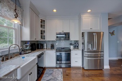 Welcome to this luxurious updated waterfront home in the - photo 33