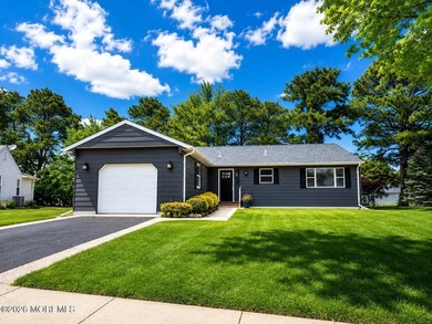 WOW! Total renovation on this gorgeous 55+ community home in - photo 1