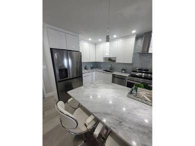 Don't miss this rare 2-bedroom gem with its own private balcony - photo 8