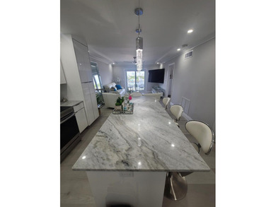Don't miss this rare 2-bedroom gem with its own private balcony - photo 9