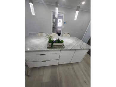 Don't miss this rare 2-bedroom gem with its own private balcony - photo 10
