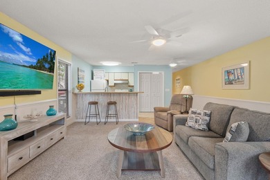 Turn-key comfort meets coastal convenience. Introducing this - photo 4
