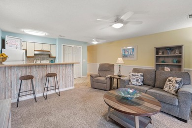 Turn-key comfort meets coastal convenience. Introducing this - photo 5