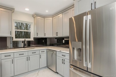 Welcome to this beautifully renovated 4-bedroom, 2.5-bath home - photo 11