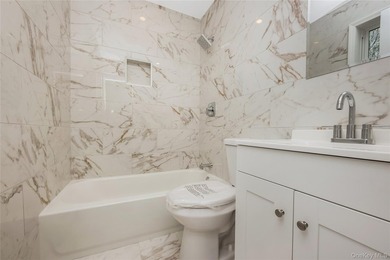 Welcome to this beautifully renovated 4-bedroom, 2.5-bath home - photo 13