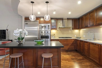 Perched high on the 27th floor, this rare end unit residence at - photo 2