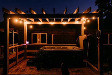 Tucked away on 2 private acres among the trees, *Simmer Down* is - photo 4