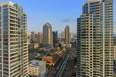 Perched high on the 27th floor, this rare end unit residence at - photo 5