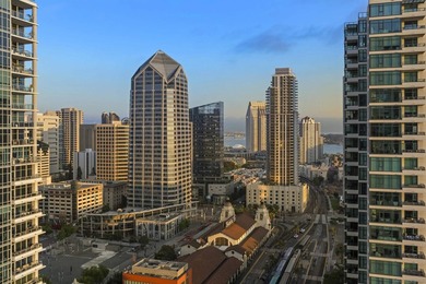 Perched high on the 27th floor, this rare end unit residence at - photo 6