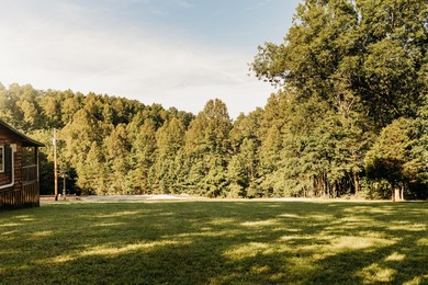 Tucked away on 2 private acres among the trees, *Simmer Down* is - photo 8