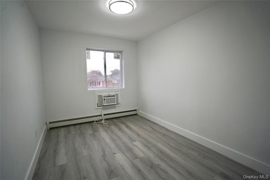 Welcome to 4658 161st Street, a fully renovated 3 family - photo 6