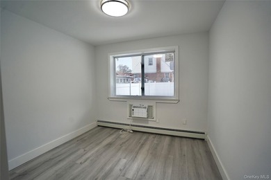 Welcome to 4658 161st Street, a fully renovated 3 family - photo 8