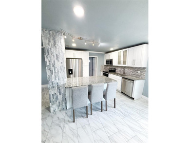 Experience modern luxury in this stunning, fully renovated - photo 7