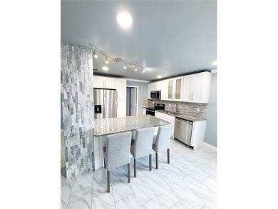 Experience modern luxury in this stunning, fully renovated - photo 8