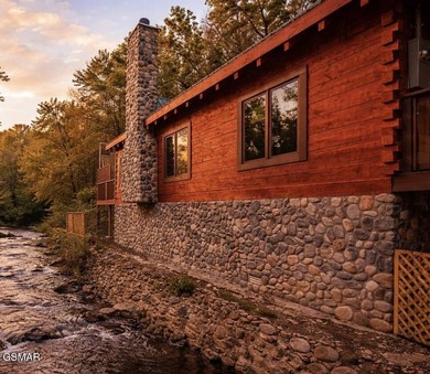 One of the most tightly held riverfront pockets in Gatlinburg. A - photo 1