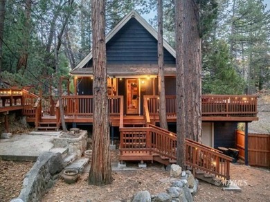 Perched on a gently sloping hillside among granite boulders and - photo 2