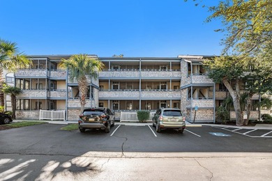 Walk to the beach from this charming top floor end unit 2 bed 2 - photo 2