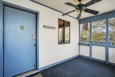Walk to the beach from this charming top floor end unit 2 bed 2 - photo 3