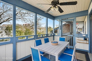 Walk to the beach from this charming top floor end unit 2 bed 2 - photo 4