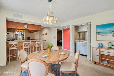 Walk to the beach from this charming top floor end unit 2 bed 2 - photo 6