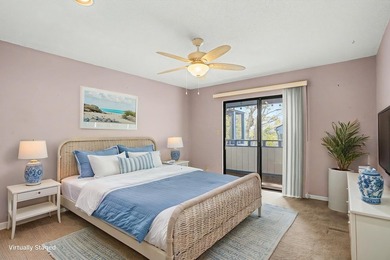 Walk to the beach from this charming top floor end unit 2 bed 2 - photo 7