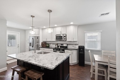 This beautifully updated 4 bed 2 bath sprawling ranch is - photo 8