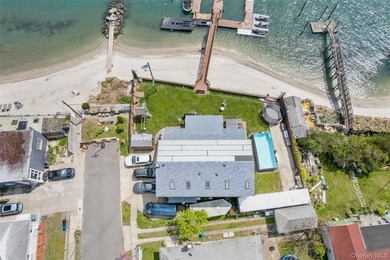 Experience exceptional waterfront living at 125 Beach 3rd Street - photo 1