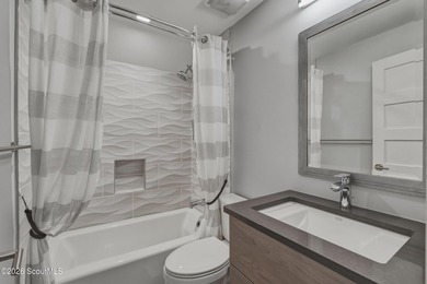 Experience the pinnacle of coastal luxury in this exceptional - photo 50