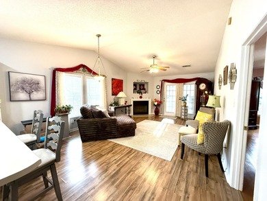 Welcome to this 3 BR/2 BA end unit on a corner cul-de-sac lot