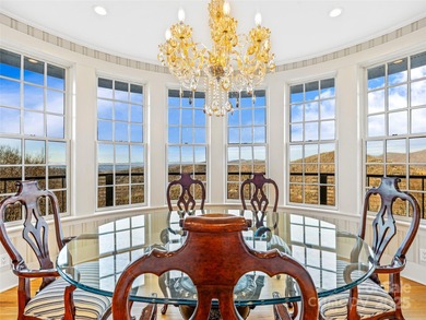 Commanding one of Asheville's most awe-inspiring mountain