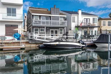 This stunning three-level waterfront home on Sunset Island - photo 1