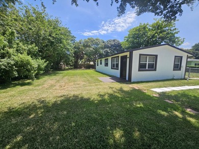 Nicely presented 4 bedroom & 2 bath Home on extra large fenced - photo 13