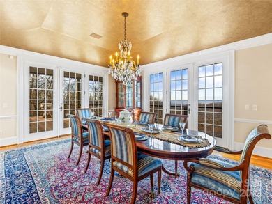 Commanding one of Asheville's most awe-inspiring mountain