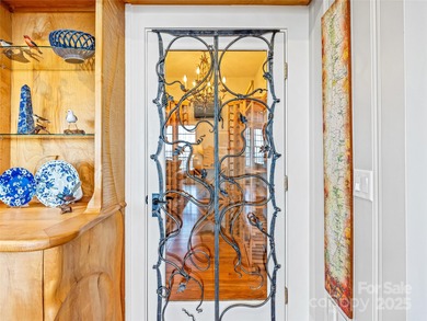 Commanding one of Asheville's most awe-inspiring mountain