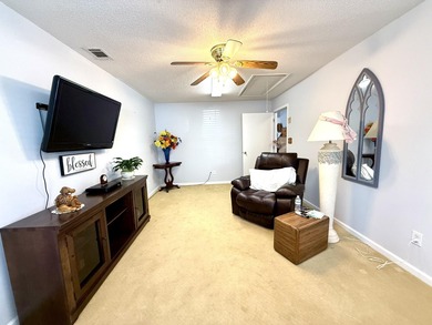 Welcome to this 3 BR/2 BA end unit on a corner cul-de-sac lot