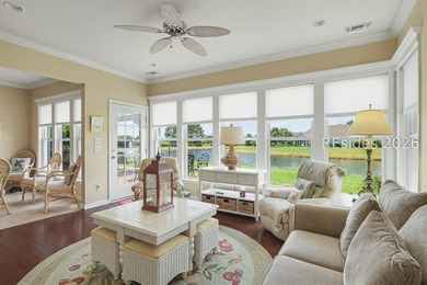 Set on a large premium lot with peaceful lagoon views, timeless - photo 2