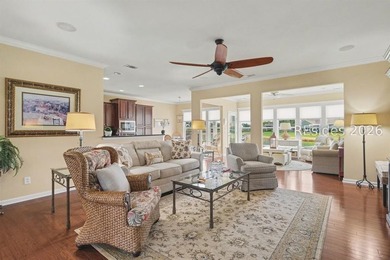 Set on a large premium lot with peaceful lagoon views, timeless - photo 5