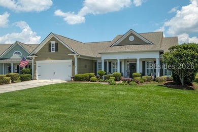 Set on a large premium lot with peaceful lagoon views, timeless - photo 6