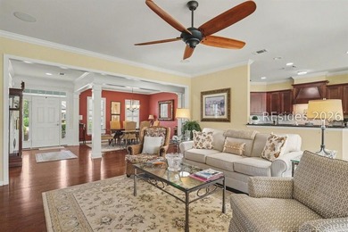 Set on a large premium lot with peaceful lagoon views, timeless - photo 7