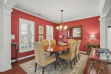 Set on a large premium lot with peaceful lagoon views, timeless - photo 8