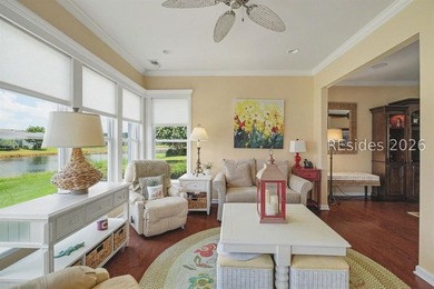 Set on a large premium lot with peaceful lagoon views, timeless - photo 9