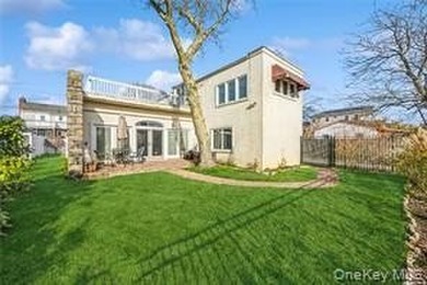 Lovely Two Story Bi-Level Home Located The Westholme, Bayside - photo 2