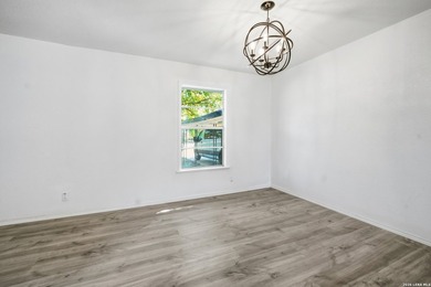 Welcome to 7635 Dove Dr! This 3 bedroomm, 2 bath home sits on - photo 14