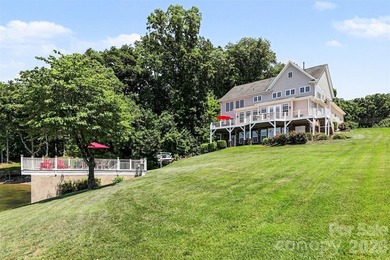 With sweeping open-water views, a private beach, and an - photo 12