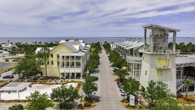 Wake up to sweeping bay views, coastal breezes, and the - photo 50