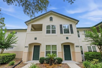 Extensively renovated in 2023, this second-floor end unit offers - photo 2